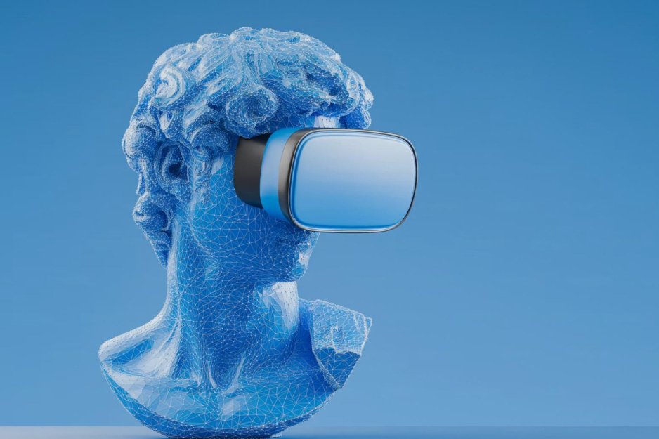 Blue geometric bust wearing a virtual reality headset against a blue sky background, representing virtual reality tech.